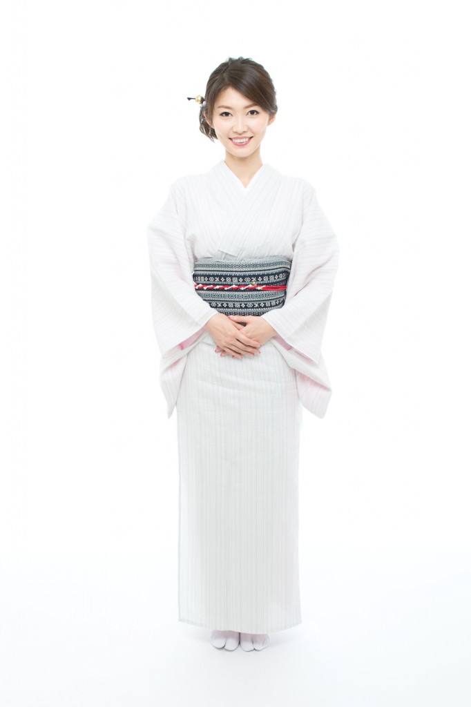 Beautiful young woman wearing japanese traditional kimono